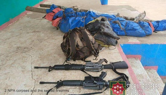 2 NPA corpses and seized firearms
