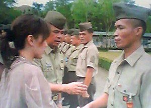 Congresswoman Sharee Ann Tan awarding 8th ID men