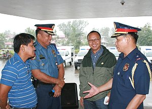 Eastern Samar governor Ben Evardone with police officers