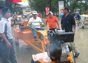 Samar acting governor Jesus Redaja test drive a hand tractor