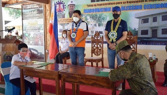 Ceremonial Signing of Acceptance of Facility