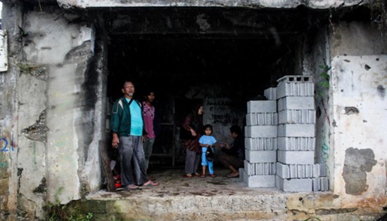 Residents visit their homes